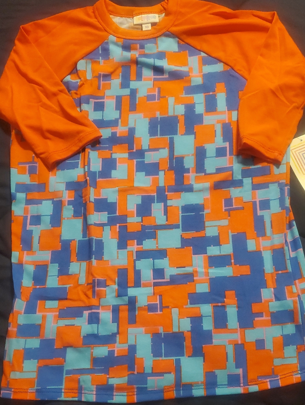 LuLaRoe Orange, Blue & Light Blue Geometric Raglan Tee